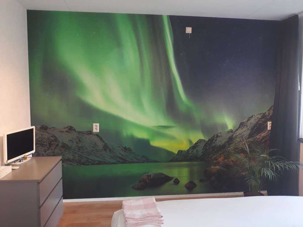 Nordlichter zwischen zwei Fjorden auf Fototapete