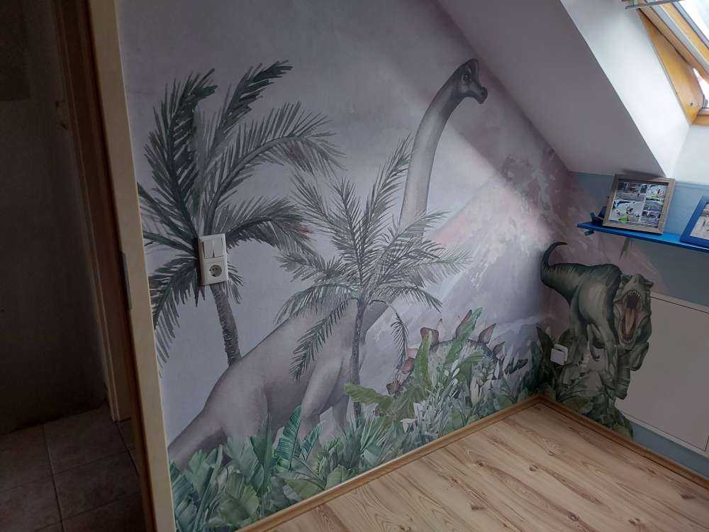 Dinosaurier bei einem Vulkan