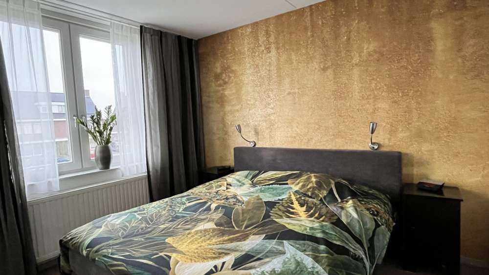 Ockerhaltiger gelber Beton auf Fototapete