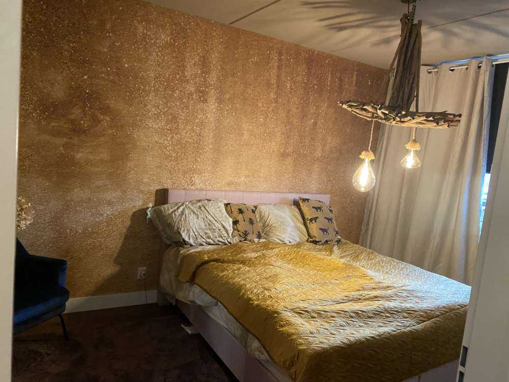 Ockerhaltiger gelber Beton auf Fototapete