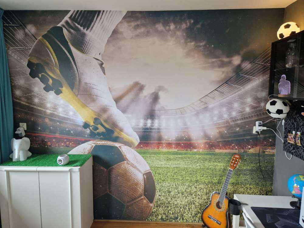 Fußballspieler im Stadion