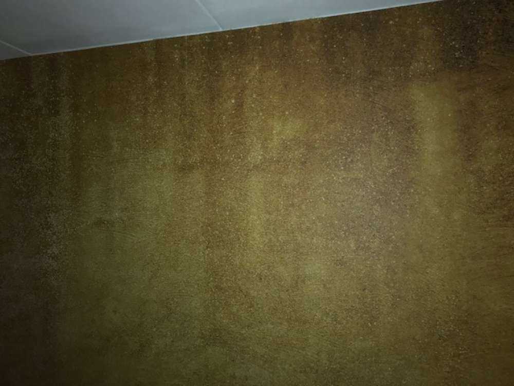 Ockerhaltiger gelber Beton auf Fototapete