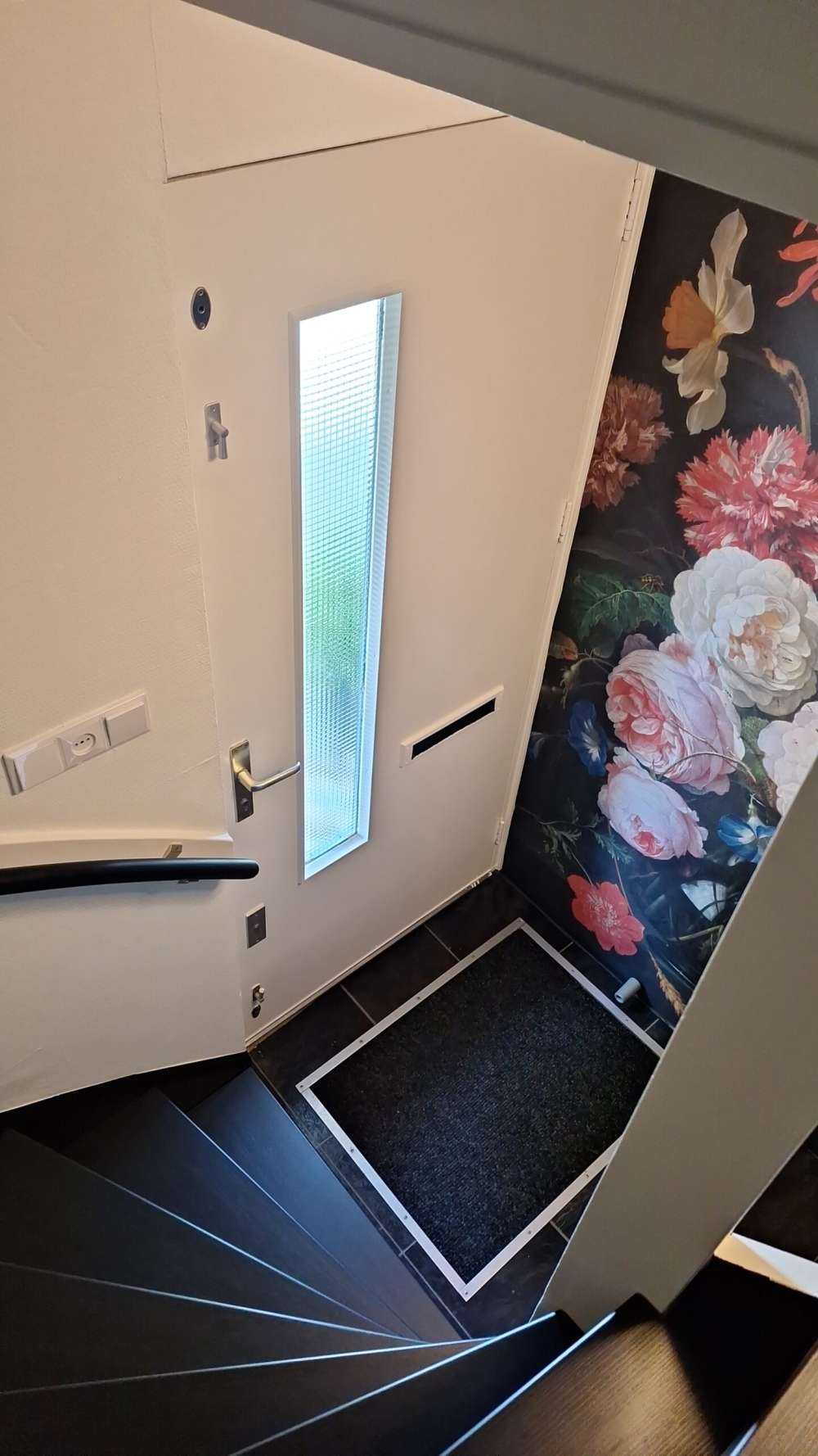 Stillleben mit Blumen in einer Glasvase