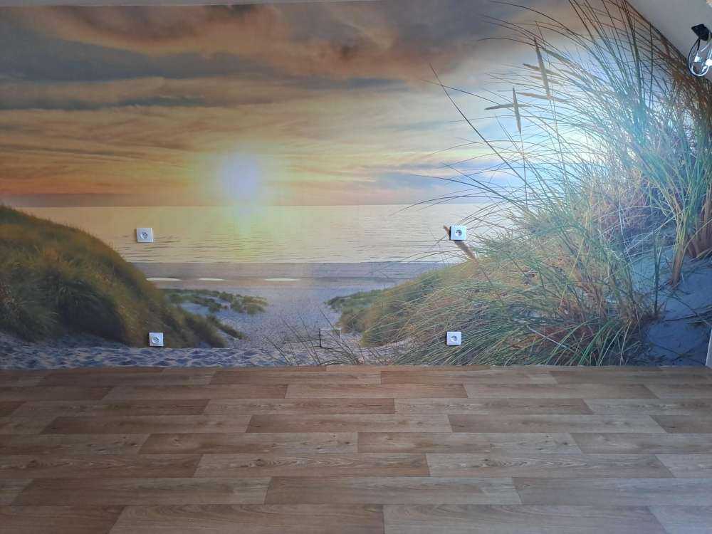 Sonnenuntergang am Dünenstrand