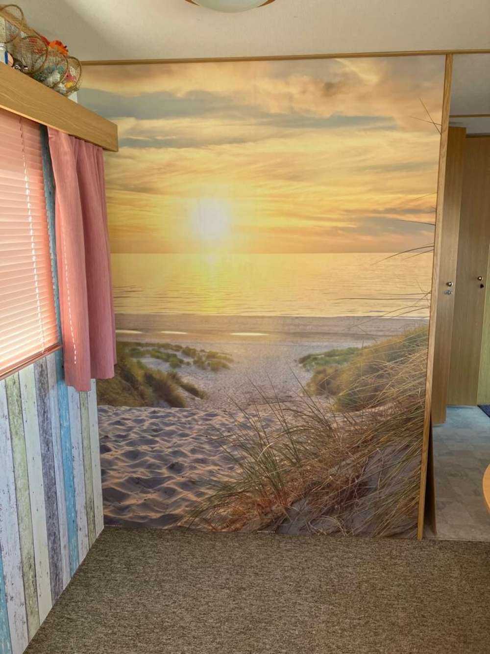 Sonnenuntergang am Dünenstrand