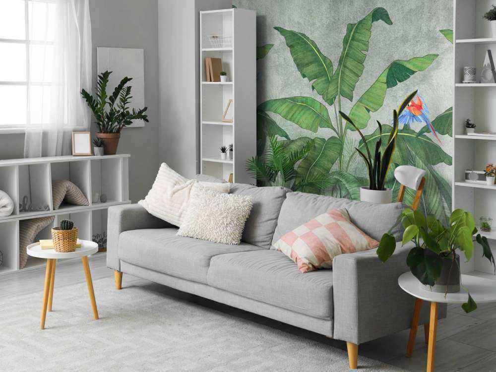 Tropische Blätter auf Beton