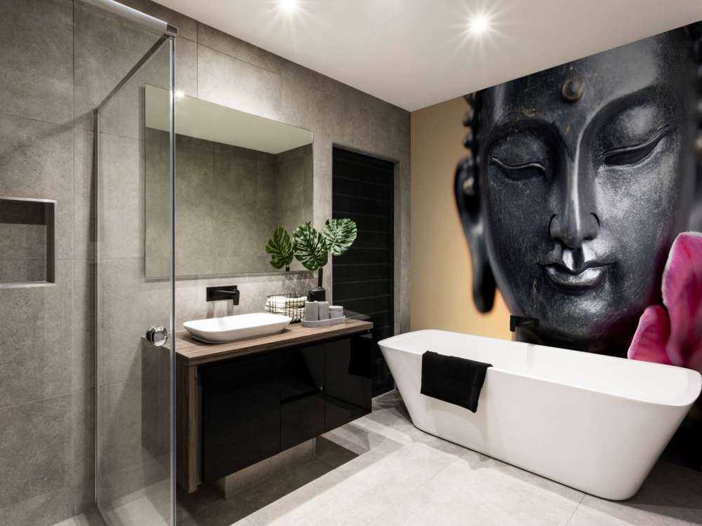 Buddha und rosa Orchidee
