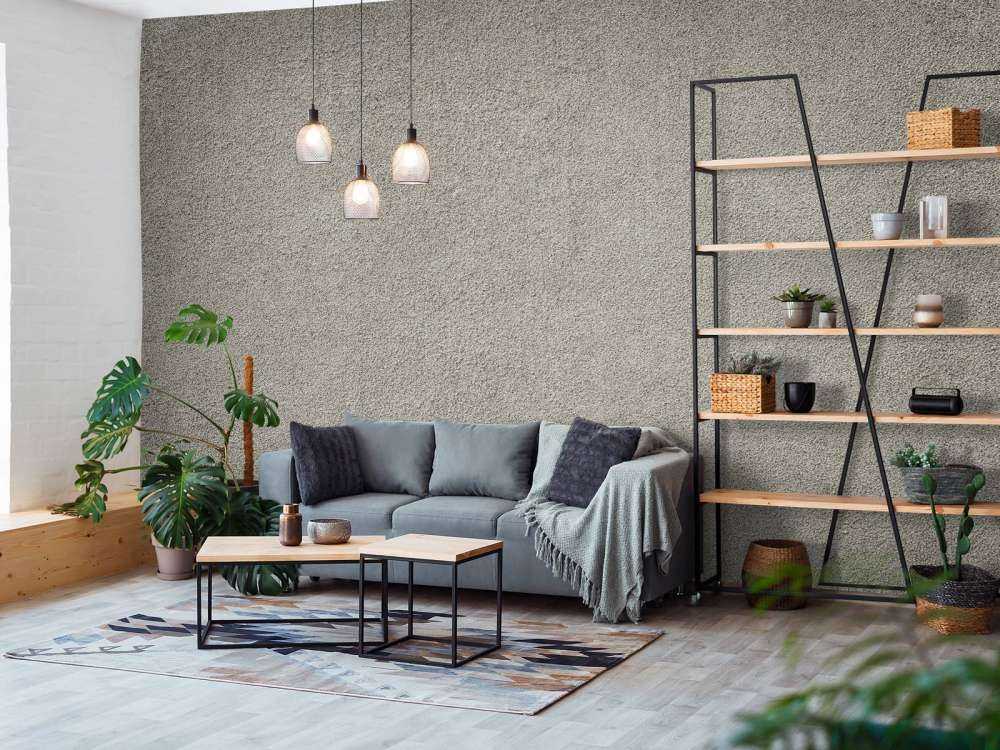 Betonmauer mit feinen Steinen