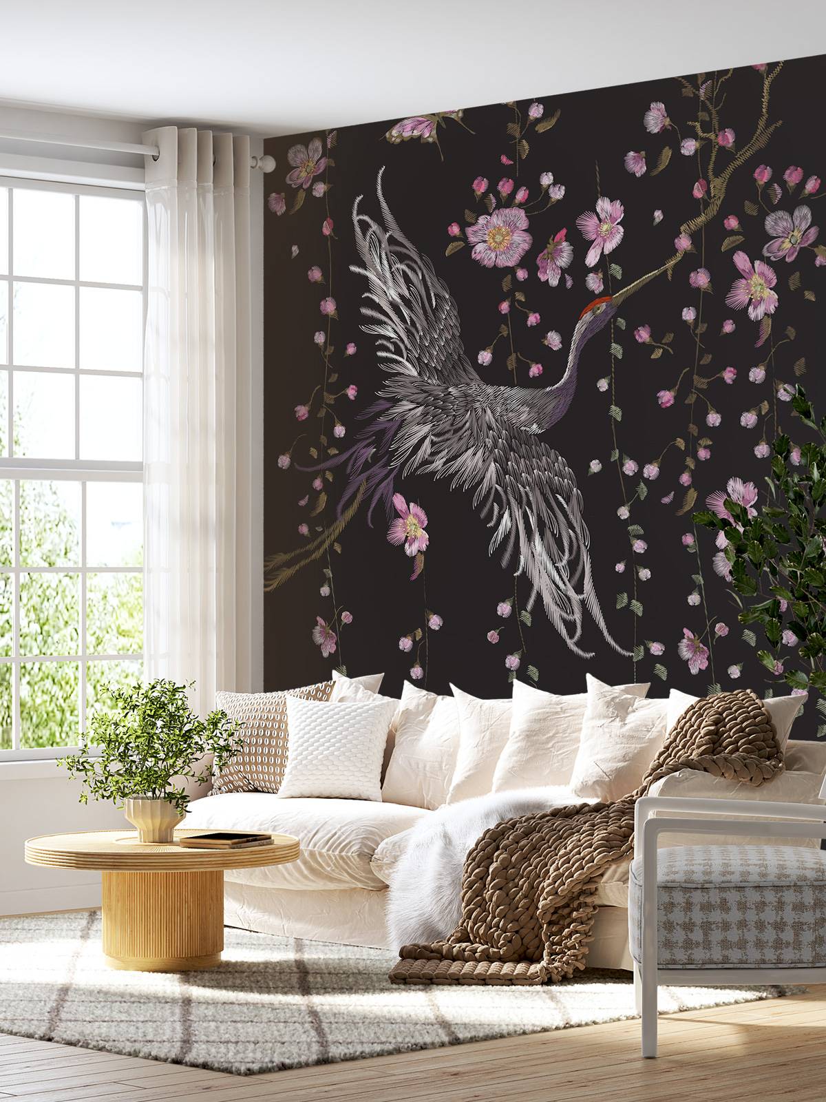 Kraniche mit rosa Blumen