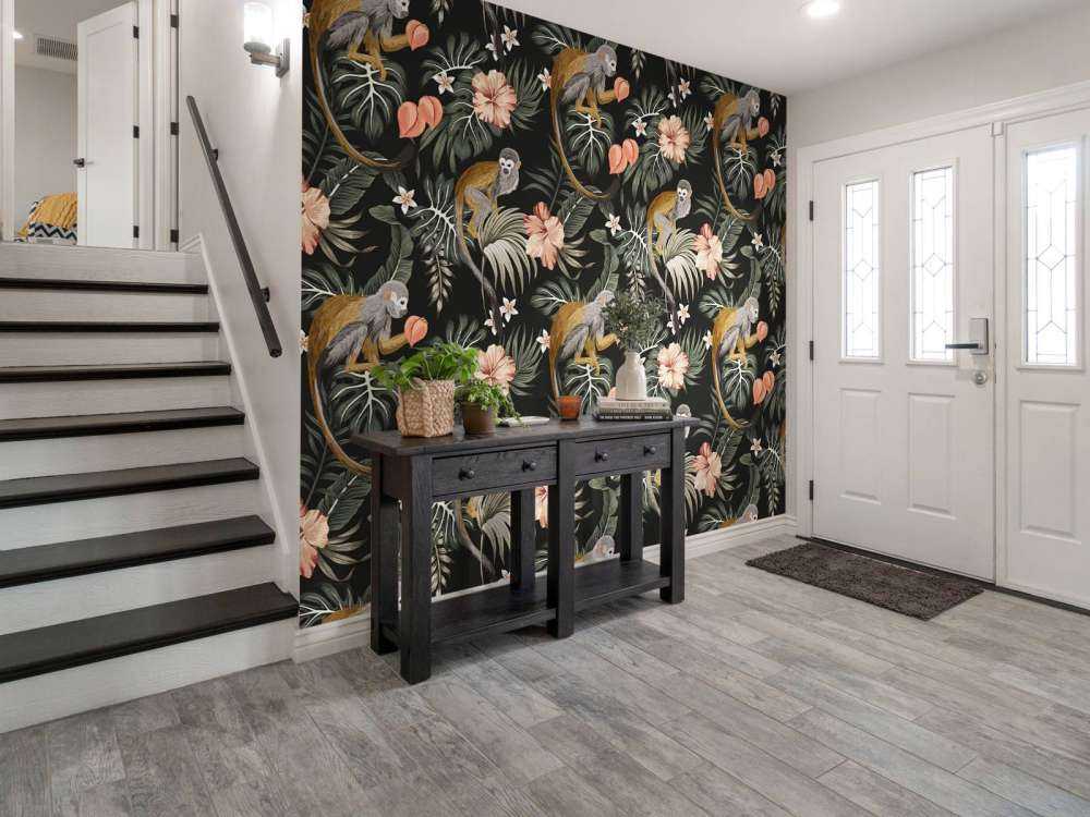 Tropische Blätter mit Affen