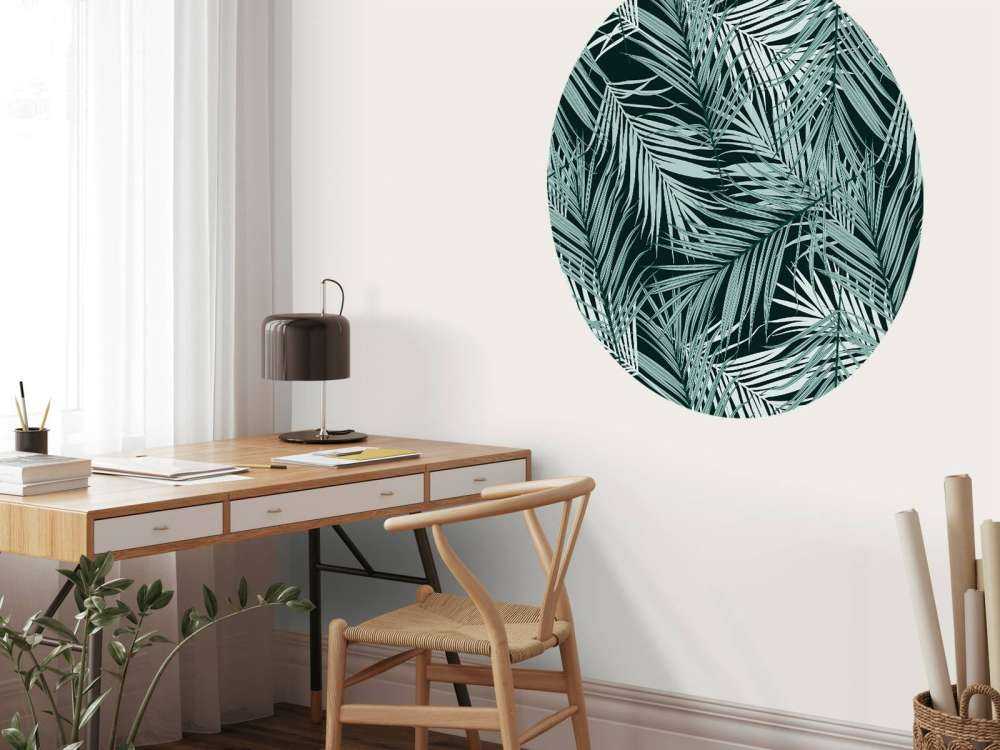 Tropische Blätter auf schwarzem Hintergrund