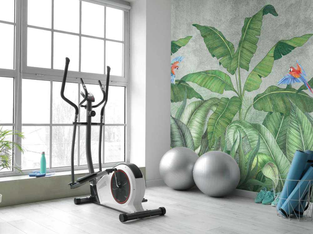 Tropische Blätter auf Beton