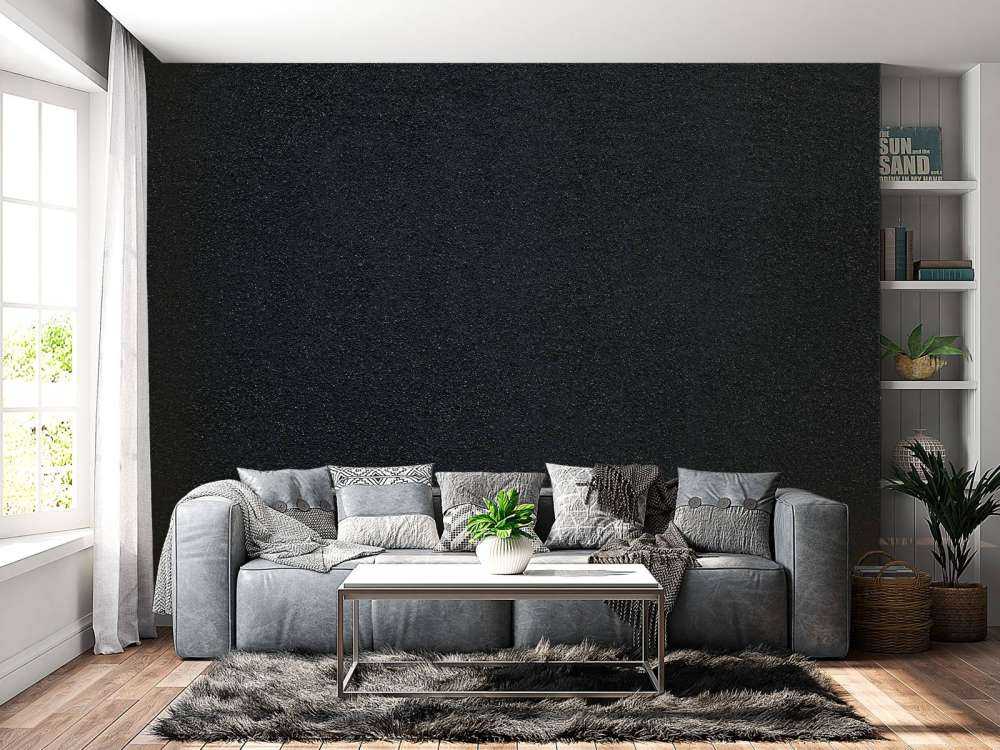 Dunkle Wand mit feinen Steinen