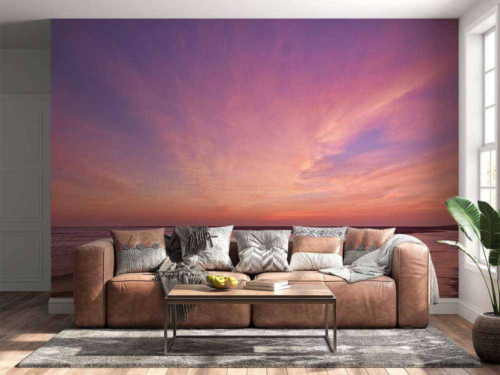 Strand mit rosa Sonnenuntergang