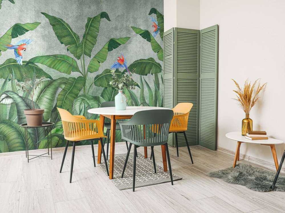 Tropische Blätter auf Beton