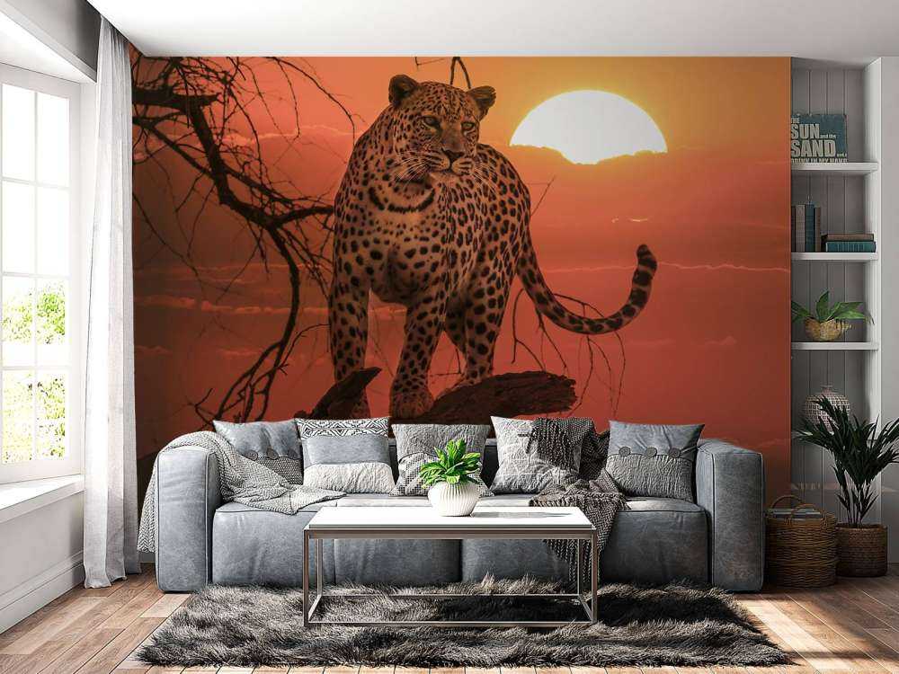 Leopard mit untergehender Sonne