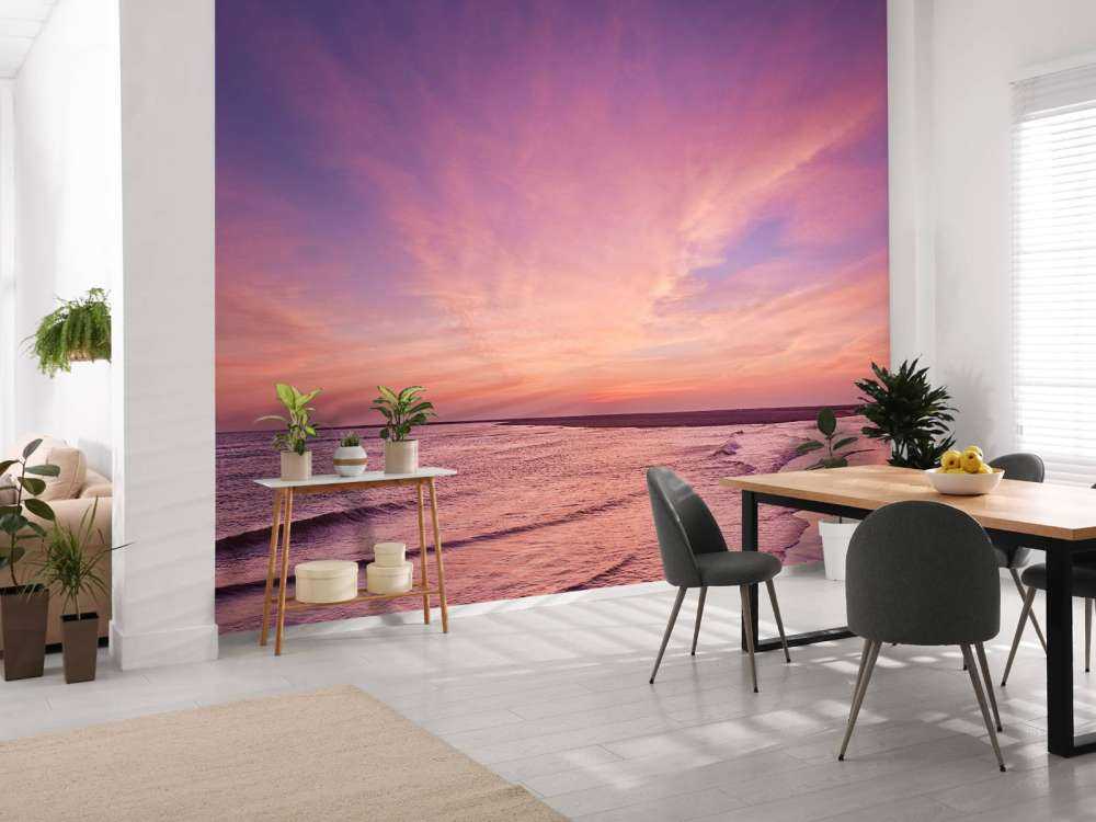 Strand mit rosa Sonnenuntergang