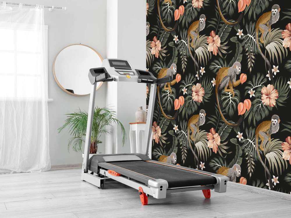 Tropische Blätter mit Affen