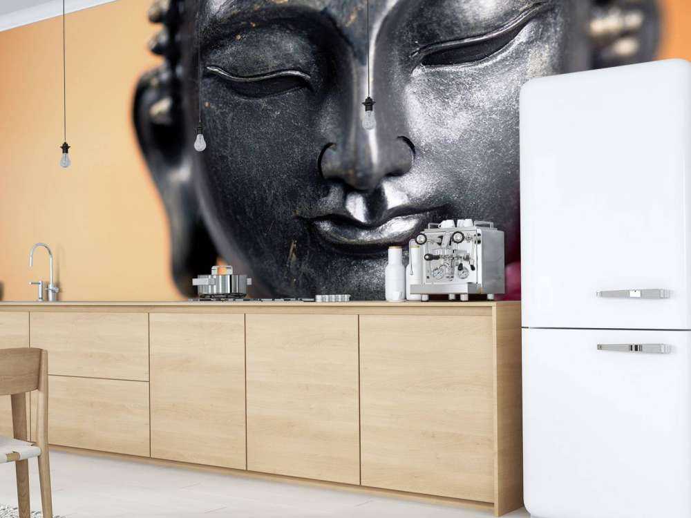 Buddha und rosa Orchidee