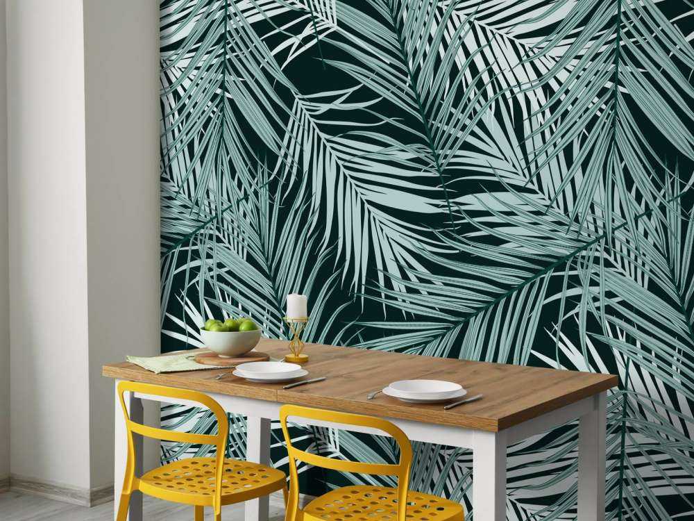 Tropische Blätter auf schwarzem Hintergrund