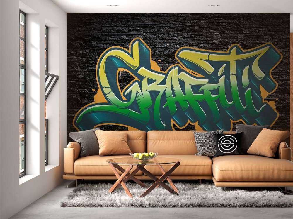 Graffiti auf Wand aus schwarzen Steinen