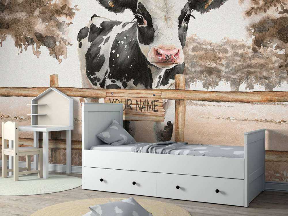 Junge Kuh auf einer Wiese taupe