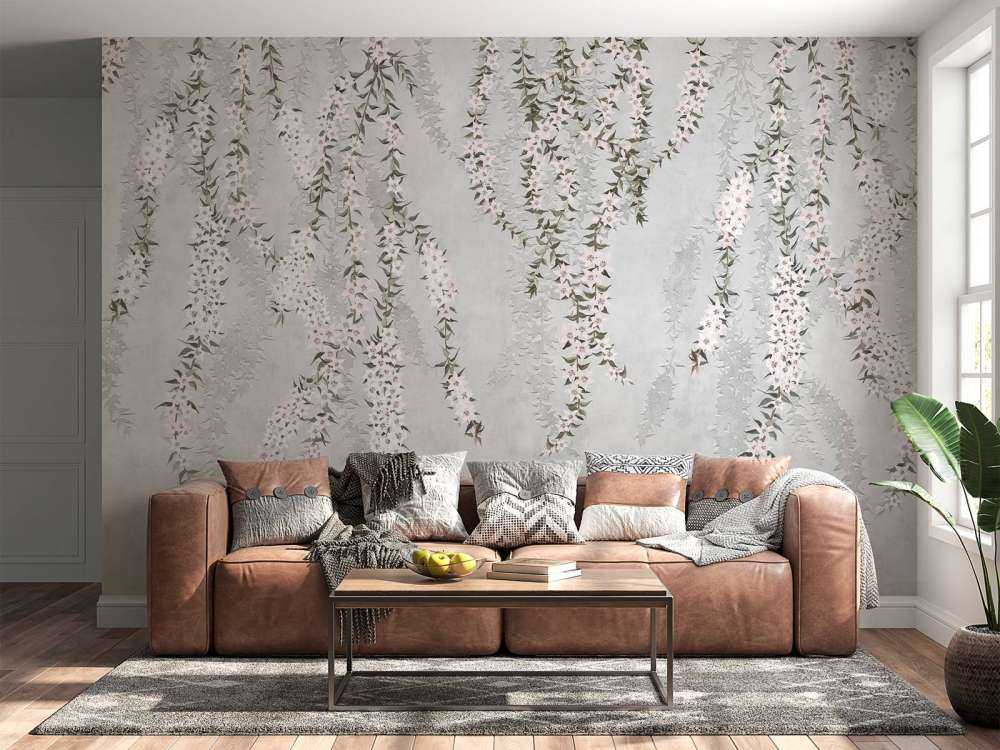 Blumenzweige auf hellblauem Beton