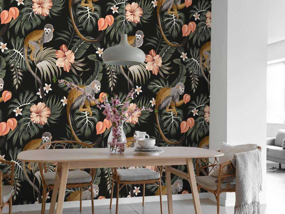 Tropische Blätter mit Affen