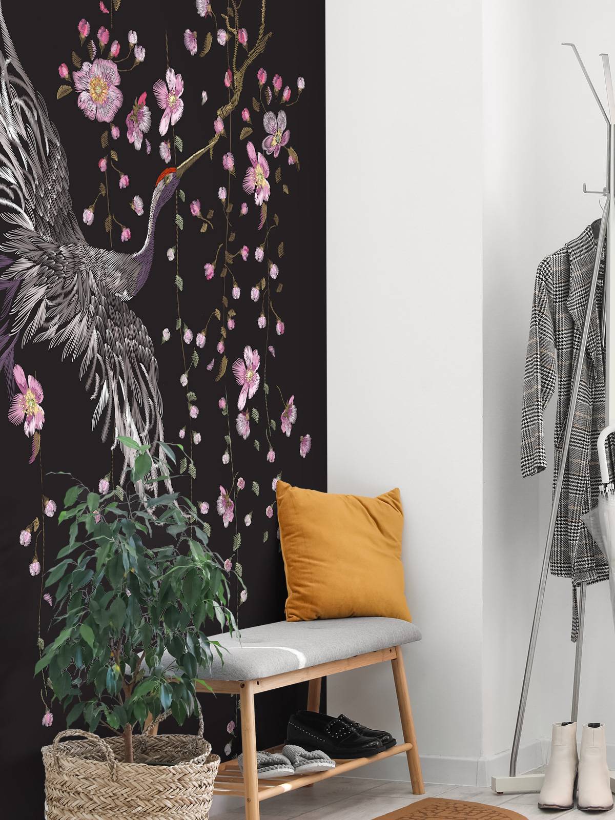 Kraniche mit rosa Blumen