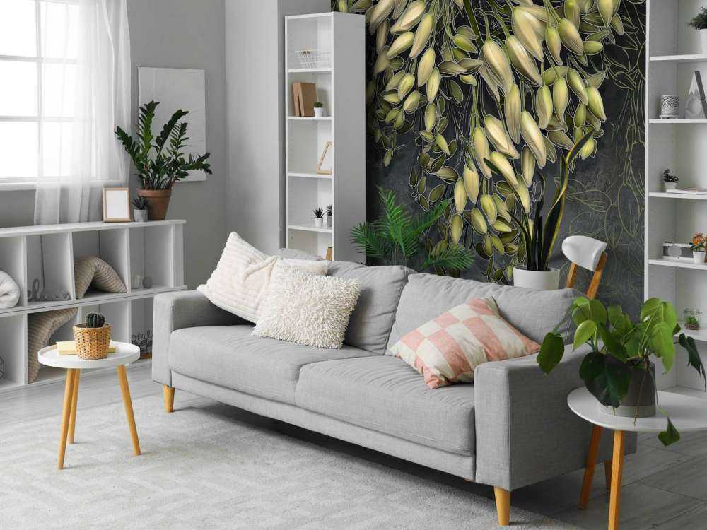 Weiße Blütenkelche auf dunkelgrauer Betonstruktur