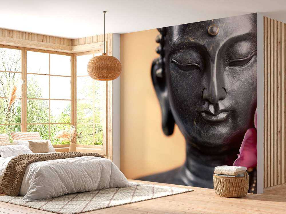 Buddha und rosa Orchidee