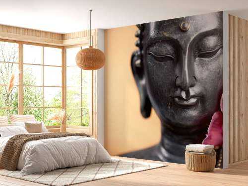Buddha und rosa Orchidee