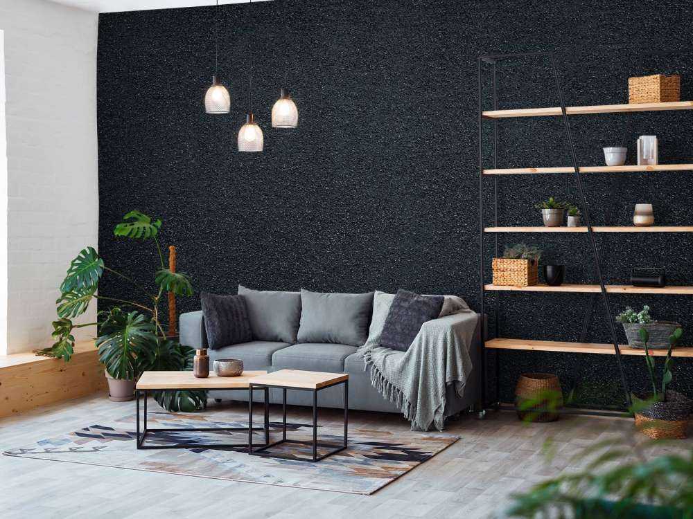 Dunkle Wand mit feinen Steinen