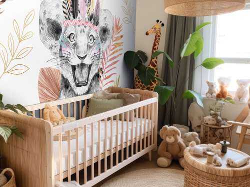 Löwenbaby mit korallenroten und goldenen Blättern
