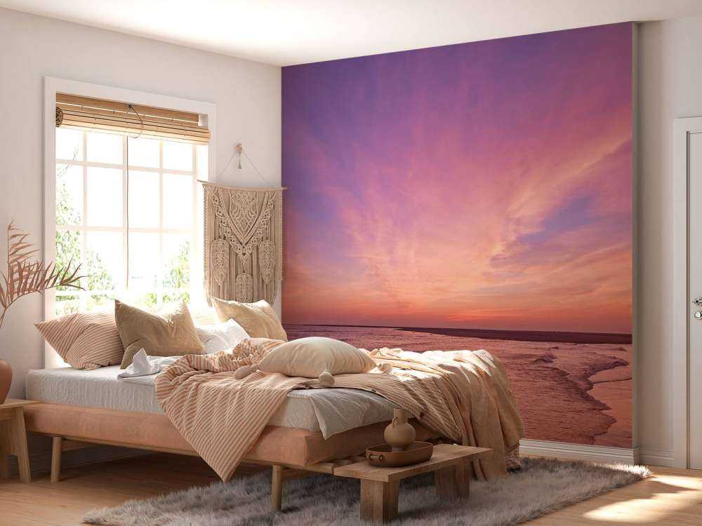Strand mit rosa Sonnenuntergang