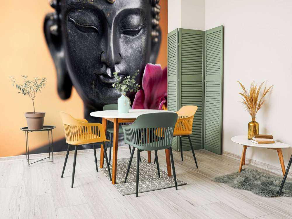 Buddha und rosa Orchidee