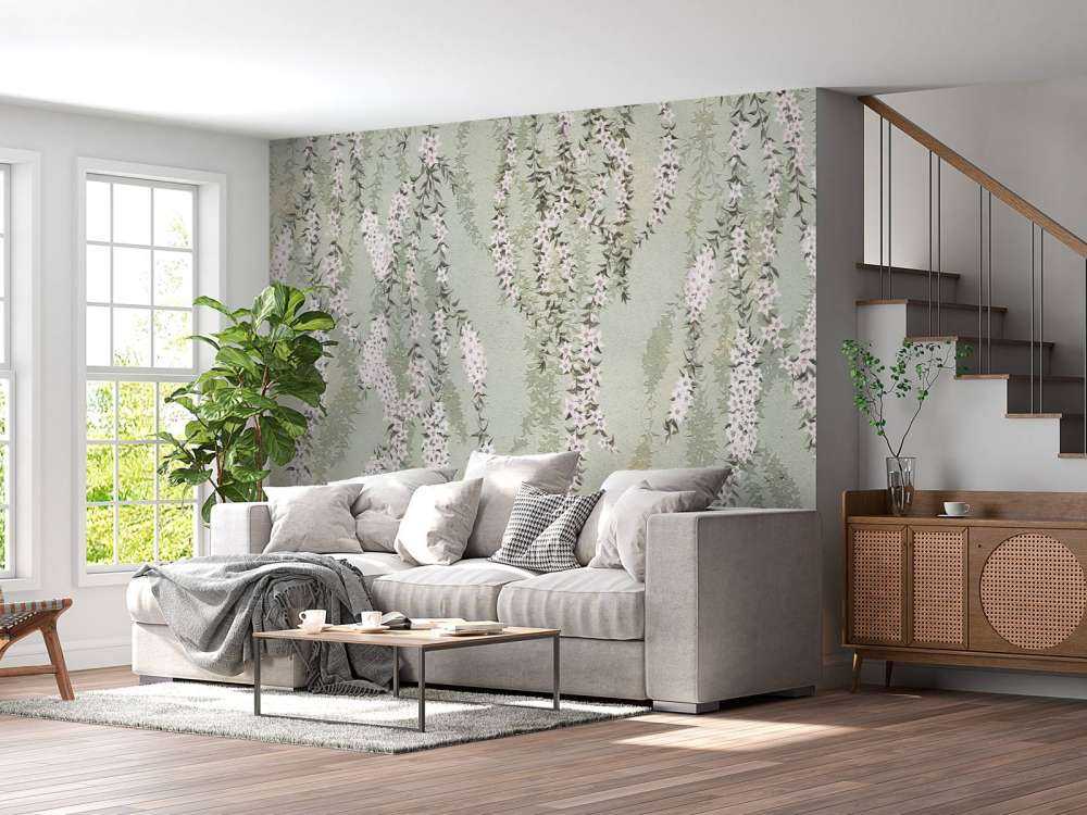 Blumenzweige auf grünem Beton